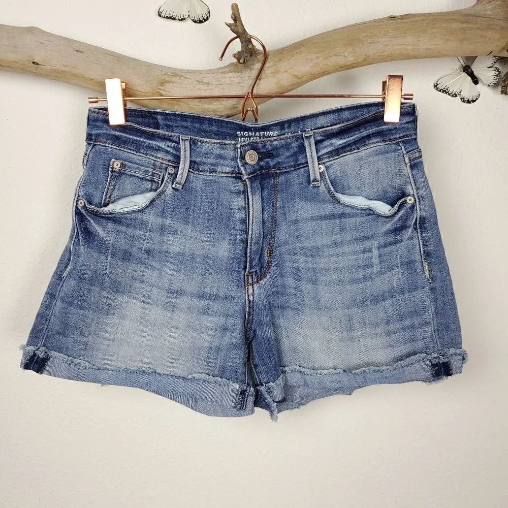 Levi's high rise distressed denim shorts